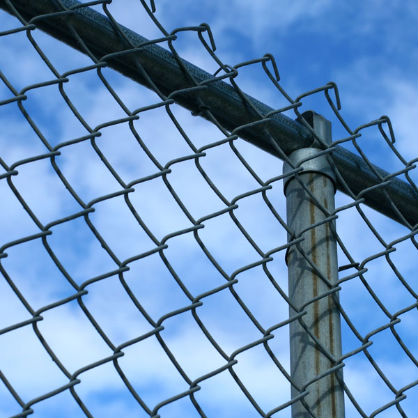 Chain Link Fence Against Sky